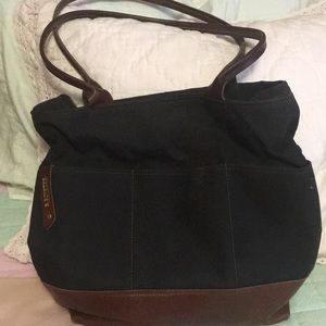 R Riveter signature purse.